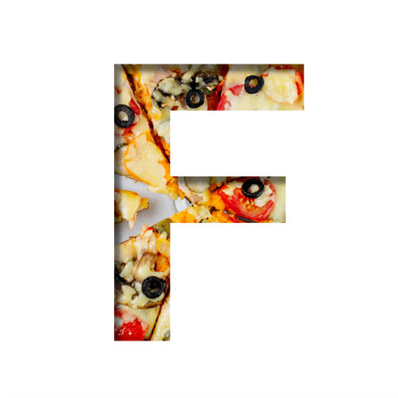 Font on pizza texture. Letter F, cut out of paper on a background of real mediterranean pizza....