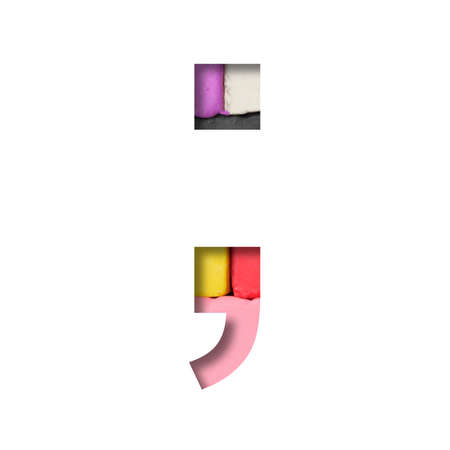 Multi-colored plasticine font. Punctuation marks dot and comma cut out of paper on a background of pieces of colored plasticine. A set of volumetric color fonts.の写真素材