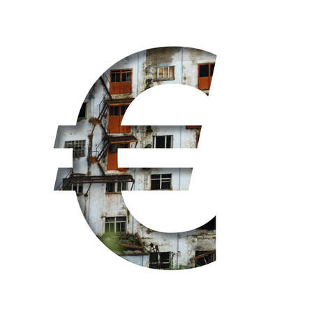 Font on an abandoned industrial building. Euro money business symbol cut out of paper on a background of windows and doors of an abandoned industrial building. Set of decorative fonts.の写真素材