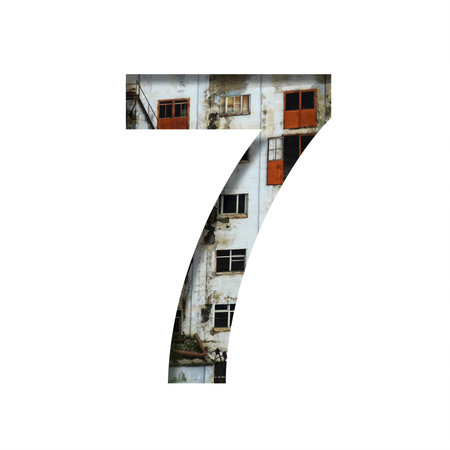 Font on an abandoned industrial building. The digit seven, 7 cut out of paper on a background of...