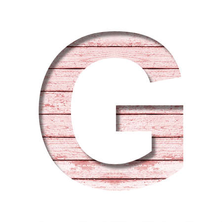 Font on boards with old paint. The letter G cut out of paper on a rustic background of old boards with pink paint. Set of decorative fonts.の写真素材