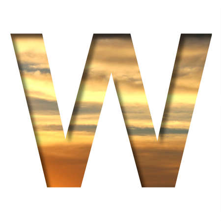 Font on the sunset sky. The letter W cut out of paper on the background of the colorful sky at beautiful sunset. Set of decorative natural fonts.の写真素材