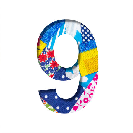 Handicraft or creative font. Digit nine, 9 cut out of paper on the background of the texture of...