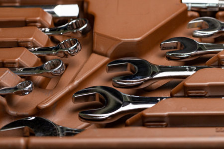 A set of high quality wrenches for repairing a car or mechanisms, close-up.
