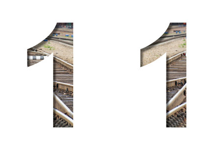 Railway font. The number one, 1 is cut out of white paper against the background of railroad rails,...