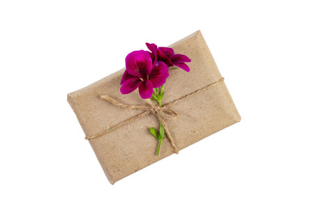 Romantic gift with a bouquet of beautiful flowers for Valentines Day or Mothers Day, top view.