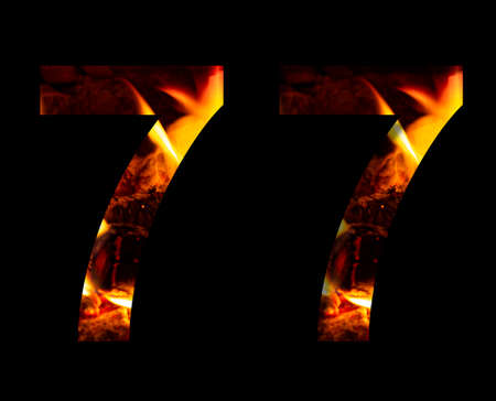The number seven, 7 made from fire and burning wood on a black background, a double version of the alphabet for decorative signatures.の写真素材