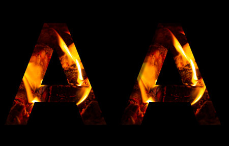 The letter A made from fire and burning wood on a black background, a double version of the alphabet...