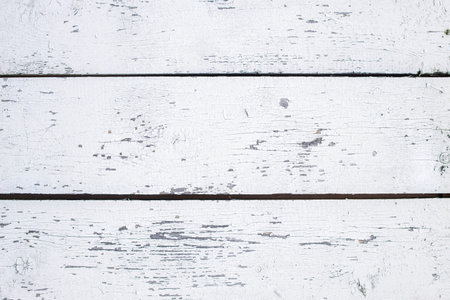 Texture of painted boards with cracked scuffs, top view.の写真素材
