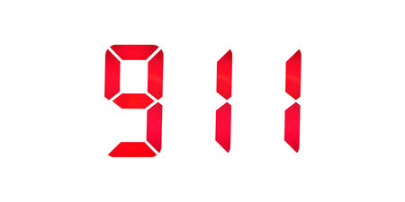 911 dialed with digits of a seven-segment indicator in red on white isolated, emergency call...