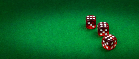 Wide view, Dice on green casino cloth, gambling background concept