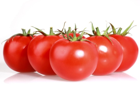 Fresh tomatoes on white backgroundの写真素材