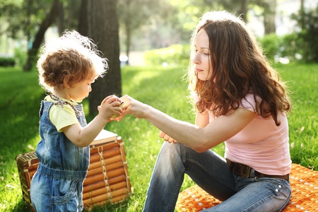Family having picnic in summer parkの写真素材