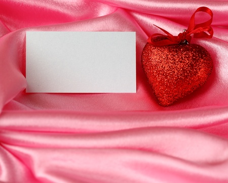 Valentine`s card - hearts and blank on pink satinの写真素材