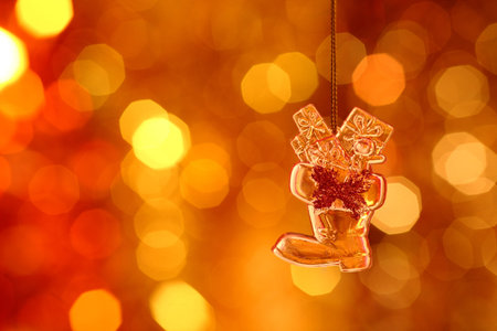 Christmas boot on gold blur backgroundの写真素材
