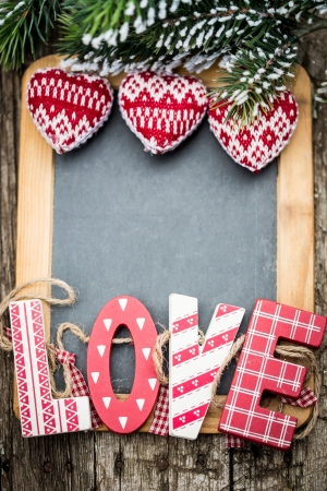 Handmade vintage letters L O V E on wooden blackboard  Valentine s day conceptの写真素材