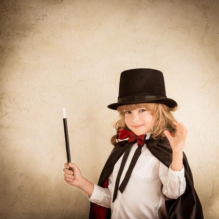 Child magician holding a wandの写真素材