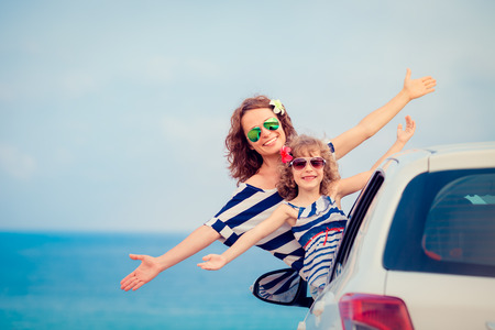 Family on vacation. Summer holiday and car travel concept Family on vacation. Summer holiday and car travel concept