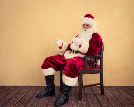 Santa Claus drive in imaginary sleigh. Christmas miracle conceptの写真素材