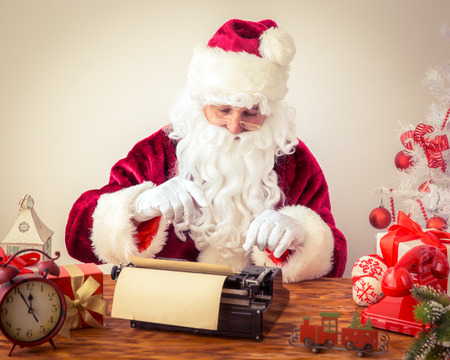 Santa Claus pound manual typewriter. Christmas holiday conceptの写真素材