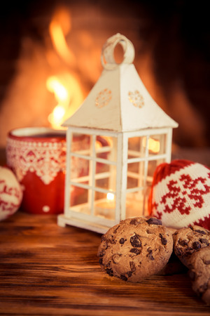 Christmas ornament near fireplace. Winter holiday conceptの写真素材