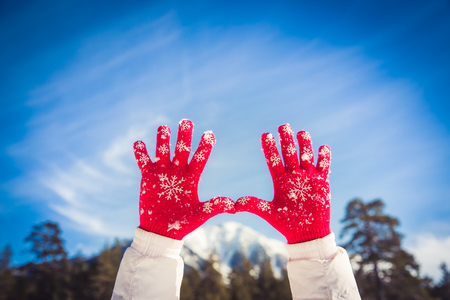 Hands against skyの写真素材