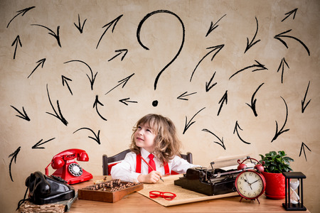 Portrait of child businessman in office. Success, creative and idea business conceptの写真素材