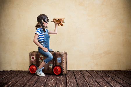 Child pretend to be sailor. Kid having fun at home. Summer vacation and travel conceptの写真素材