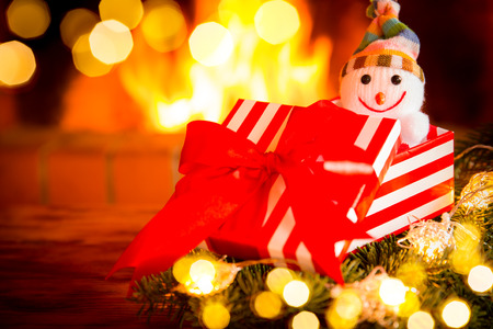 Christmas decoration near fireplace. Winter holiday Xmas and New Year conceptの写真素材