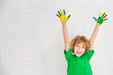Happy child playing at home. Kid having fun indoor. Spring renovation concept