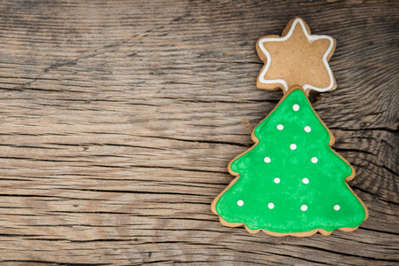 Traditional sweet Christmas cookies on wooden backgroundの写真素材