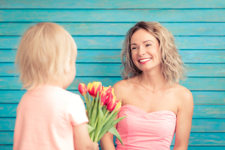 Woman and child at home. Mother and son having fun together. Spring family holiday concept. Mother's dayの写真素材