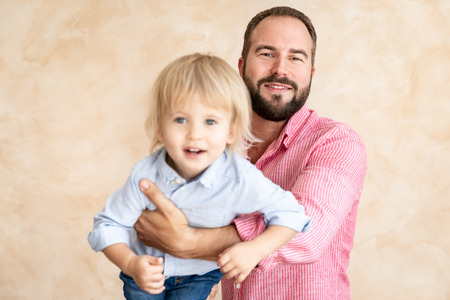 Man and child at home. Father and son having fun together. Family holiday concept. Happy Father's dayの写真素材