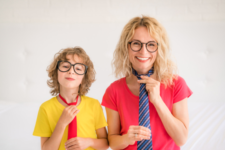 Woman and child at home. Mother and daughter having fun together. Family holiday concept. Happy Mother's dayの写真素材