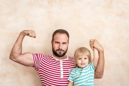 Man and child at home. Father and son having fun together. Family holiday concept. Happy Father's dayの写真素材