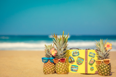 Pineapple on the beach. Summer vacation and travel conceptの写真素材