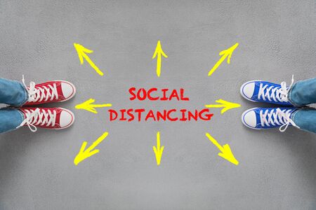 People maintain safe distance to prevent spreading infection.の写真素材