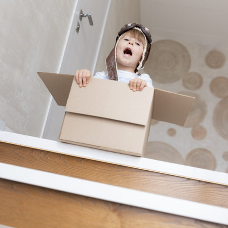 One child playing indoor. Kid having fun at home. Stay home and lockdown during coronavirus COVID-19...
