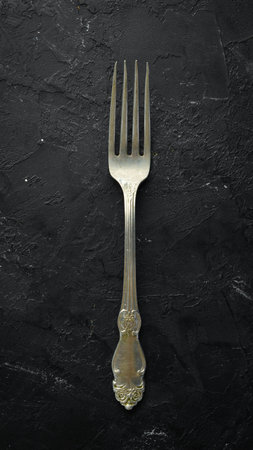 Old fork Cutlery. Top view. Free space for your text.