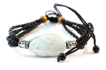 ivory handmade bracelet on white backgroundの写真素材