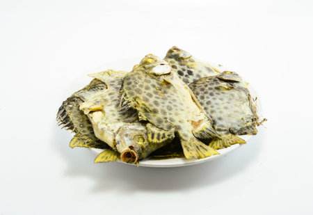 boiled  spotted scat,green scat ,thai food on white background
