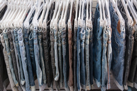 Jeans and trousers on hangers 