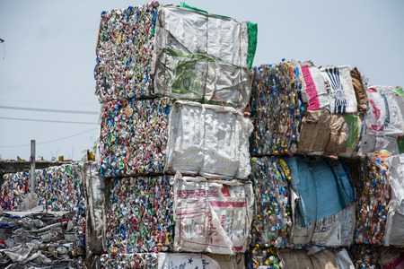  plastic and can waste on a recycling site のeditorial素材