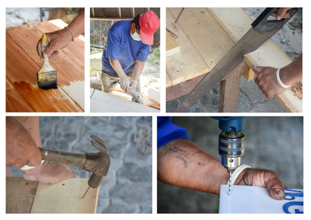 carpenter' s hands using toolの写真素材