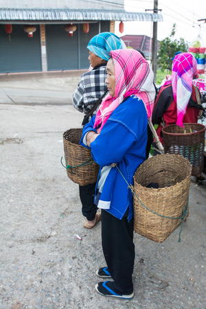 CHIANG RAI, THAILAND - DEC 14 : Mong women with traditional clothes and silver jewelery in akha hitt tribe minority village on December 14, 2014 in Chiang Rai, Thailand.のeditorial素材