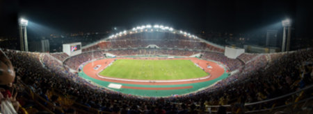 defocused background of soccer or football stadium at twilightの写真素材
