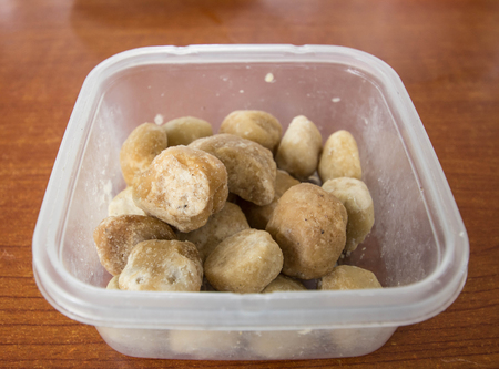 Burma cuisine, coconut with brown sugar coating regional snack foodの写真素材
