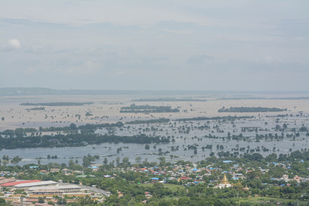 MANDALAY, MYANMAR - AUGUST 01 : View from the top of Mandalay hill showing heavy flooding in Mandalay on August 01. 2015 in Mandalay, Myanmar.のeditorial素材