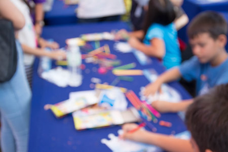 Blurred image of kid drawing and paintingの写真素材