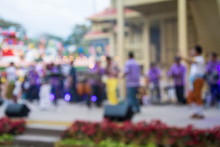 Blurred image of thai tradition folk song musicians performing on stage in Bangkok ,Thailand